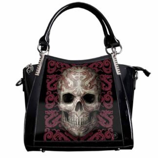 A shiny black PVC handbag - the main image is an oriental skull - a grinning skull inscribed with red eastern dragons and tribal swirls