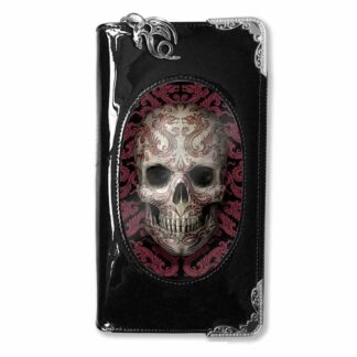 A shiny black PVC purse with silver detailing on the edges - the main image is an oriental skull - a grinning skull inscribed with red eastern dragons and tribal swirls