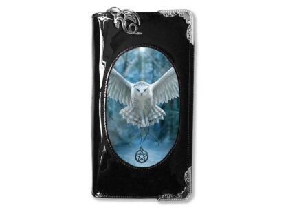 This purse has a front panel featuring a snowy white owl flying towards you, a pentagram on a chain clasped in its claws. The owl is flying out of a blue and grey forest.