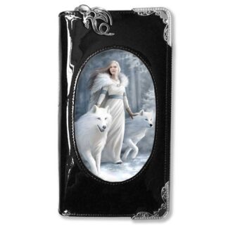 The front panel of this black purse shows a blond woman with flowing hair clad in a white gown and furry white cloak. She rests her hands on white wolves in a snowy vista.