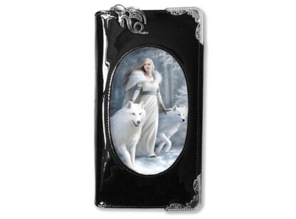 The front panel of this black purse shows a blond woman with flowing hair clad in a white gown and furry white cloak. She rests her hands on white wolves in a snowy vista.