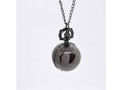 The fob watch - when closed - resembled a shiny black ball. It has a gun metal coloured long chain