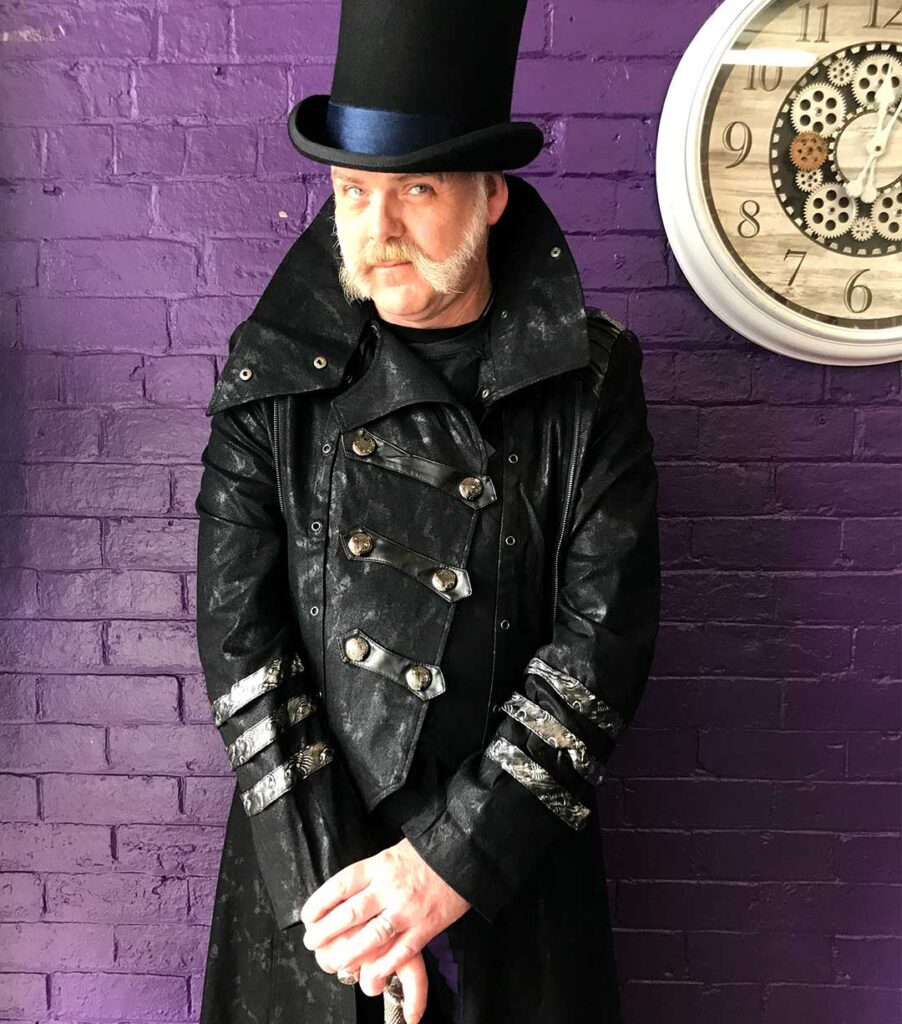 Gordon in the very goth or steampunk black winter Punk Rave coat