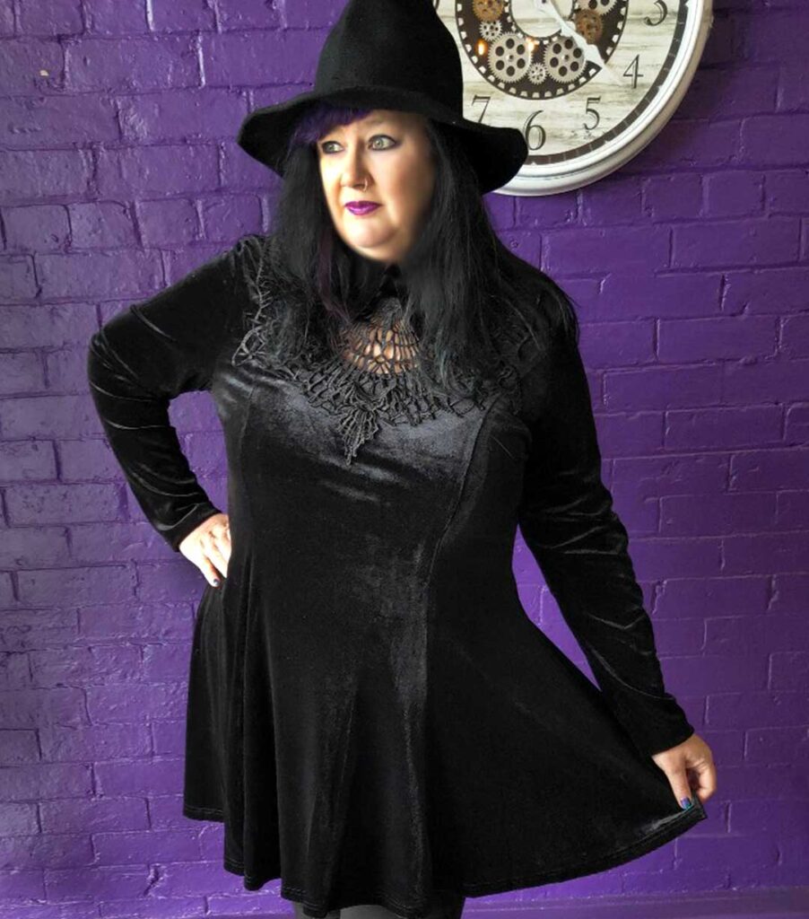 Julia is wearing the Punk Rave Goth Dark Night Vines Black Velvet Dress