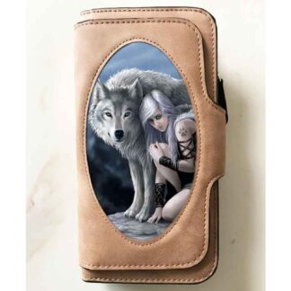The front of this purse features an image of a girl with long silver hair dressed in tribal gear crouching by a huge white wolf who is standing protectively over her